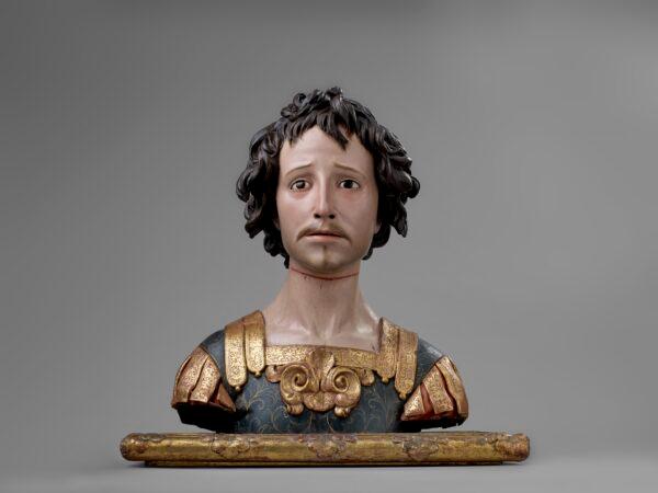 "St. Acisclus," circa 1680, by Pedro de Mena. Polychromed and gilded wood; 19 3/4 inches by 16 5/8 inches by 8 1/2 inches. (The Hispanic Society Museum & Library)
