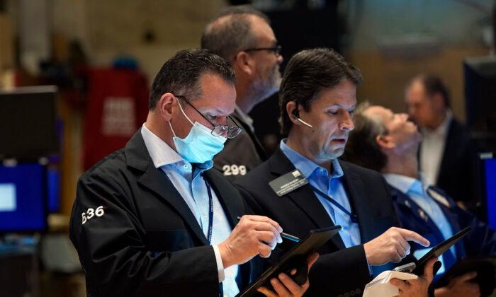 Stocks Gain, Pushing the Dow Jones Industrials Over 36,000
