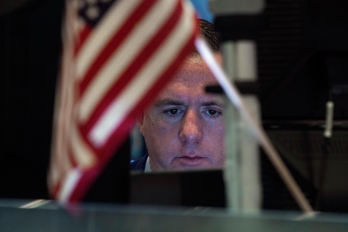 Risk Assets Sink as New COVID-19 Variant Fears Spark Rush to Safe Havens