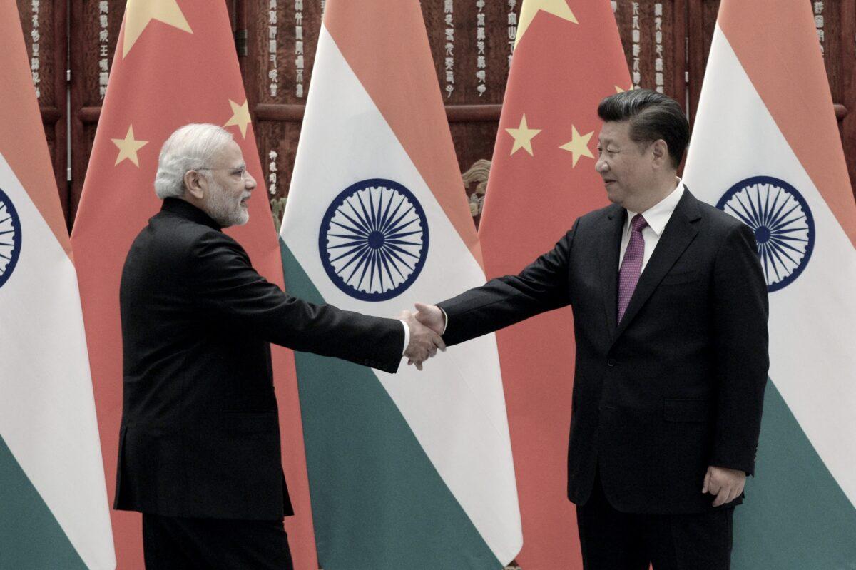 Indian Prime Minister Narendra Modi (L) shakes hands with Chinese leader Xi Jinping (R) in Hangzhou, China, on Sept. 4, 2016. (Wang Zhou/Pool/Getty Images)