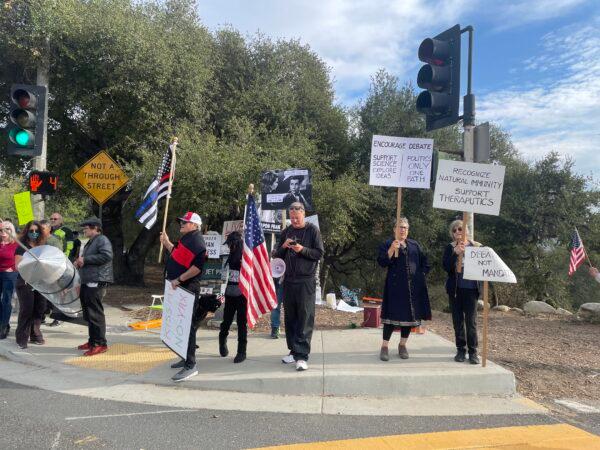 About 20 employees at the Jet Propulsion Laboratory (JPL), a NASA field center, protested the federal COVID-19 vaccine mandate in Pasadena, Calif., on Nov. 1, 2021. (Alice Sun/The Epoch Times)