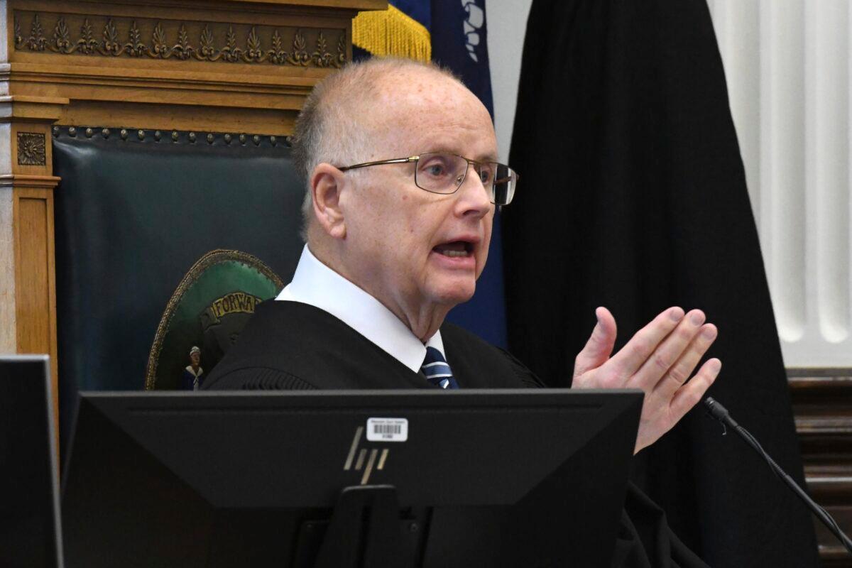 Circuit Court Judge Bruce Schroeder addresses the jury pool at the start of jury selection on the first day of trial for Kyle Rittenhouse in Kenosha, Wis., Circuit Court, on Nov. 1, 2021. (Mark Hertzberg/Pool Photo via AP)