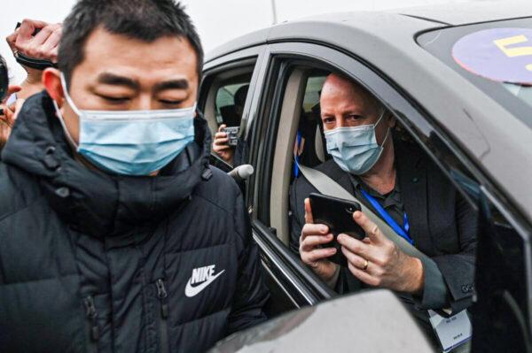 Peter Daszak, right, president of EcoHealth Alliance, is seen in Wuhan, China, on Feb. 3, 2021. (Hector Retamal/AFP via Getty Images)