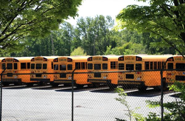 Parked school busses sit in a lot during the coronavirus (COVID-19) pandemic, in Charlotte, N.C., on April 21, 2020. Charlotte. (Streeter Lecka/Getty Images)