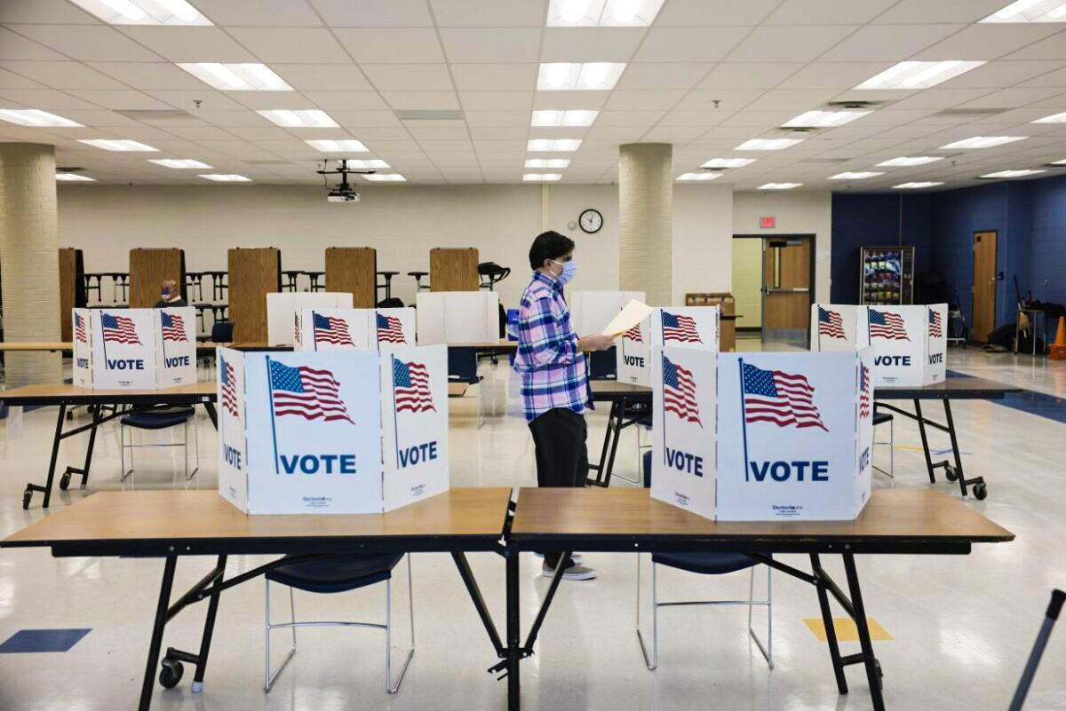 Virginia residents vote at a polling site in the Rocky Run Middle School in Chantilly, Va., on Nov. 2, 2021. (Anna Moneymaker/Getty Images)