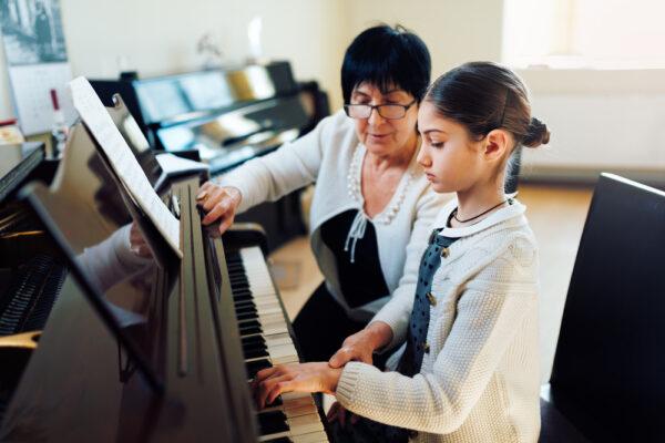 A piano lesson was once often part of a child’s weekly regime. (Dmytro Vietrov/Shutterstock)