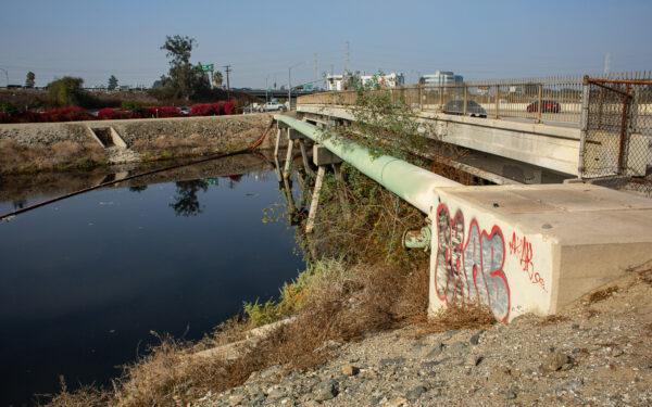Businesses and residents near the Dominguez Channel have been experiencing a foul odor from the water in Carson, Calif., on Nov. 4, 2021. (John Fredricks/The Epoch Times)