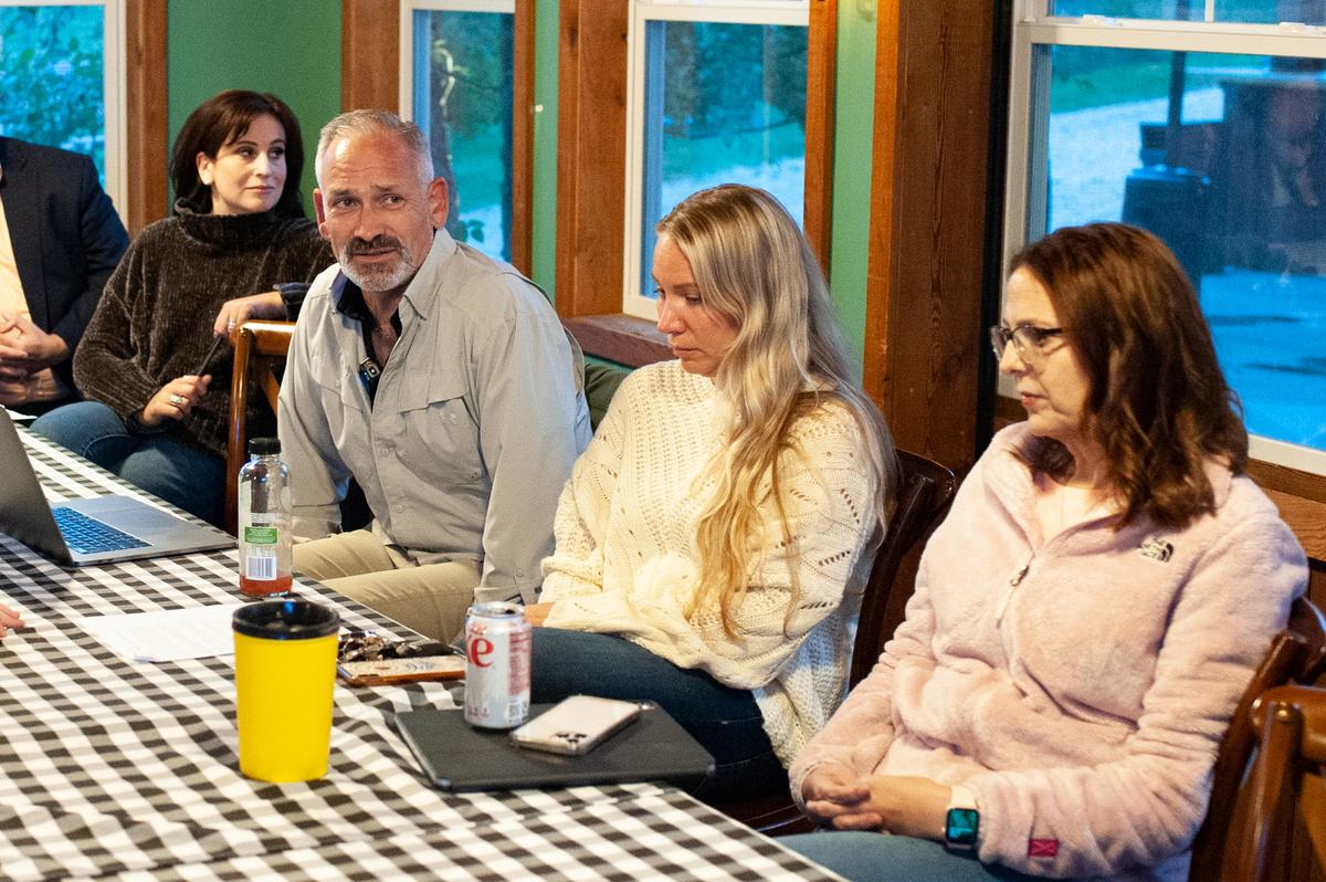 Gina Anders (L), Jon Tigges (2nd L), Marsha Lessard, and Katy Talento (R), at a “Patriot Pub” meeting in Hamilton, Va., on Oct. 28, 2021. (Caleb Spencer for The Epoch Times)