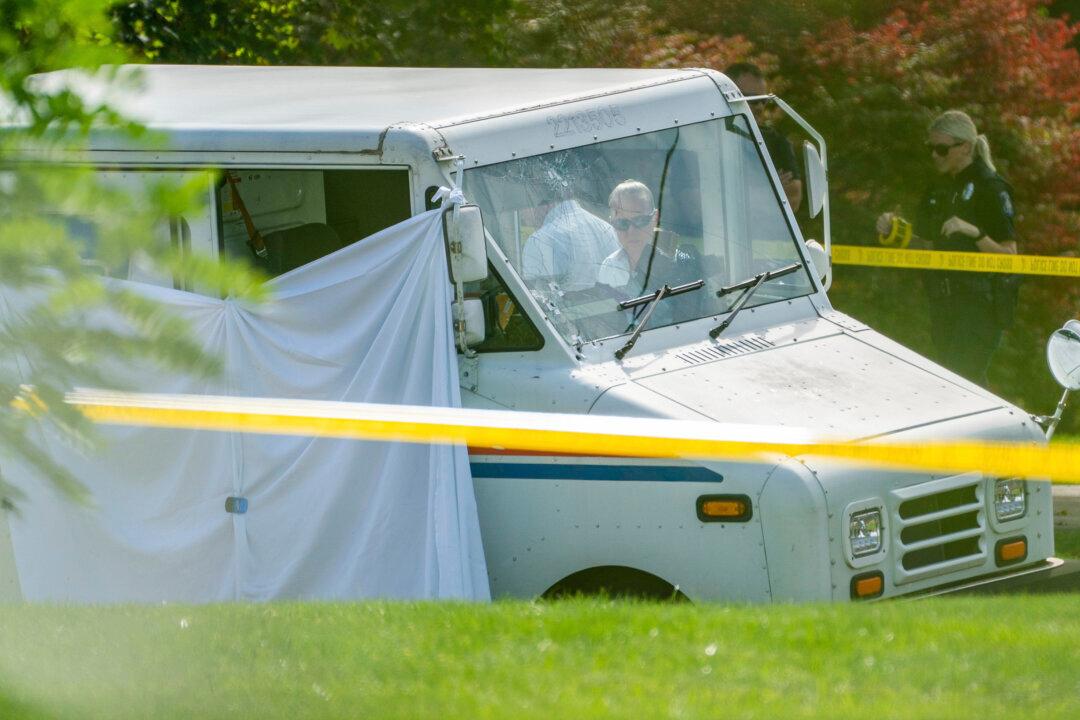 Man Indicted on Murder Charge in Shooting of Postal Worker