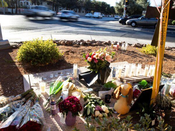 A makeshift memorial to honor Tina Tintor, 23, is seen at South Rainbow Boulevard and Spring Valley Parkway in Las Vegas, Nev., on Nov. 4, 2021. (Bizuayehu Tesfaye/Las Vegas Review-Journal via AP)