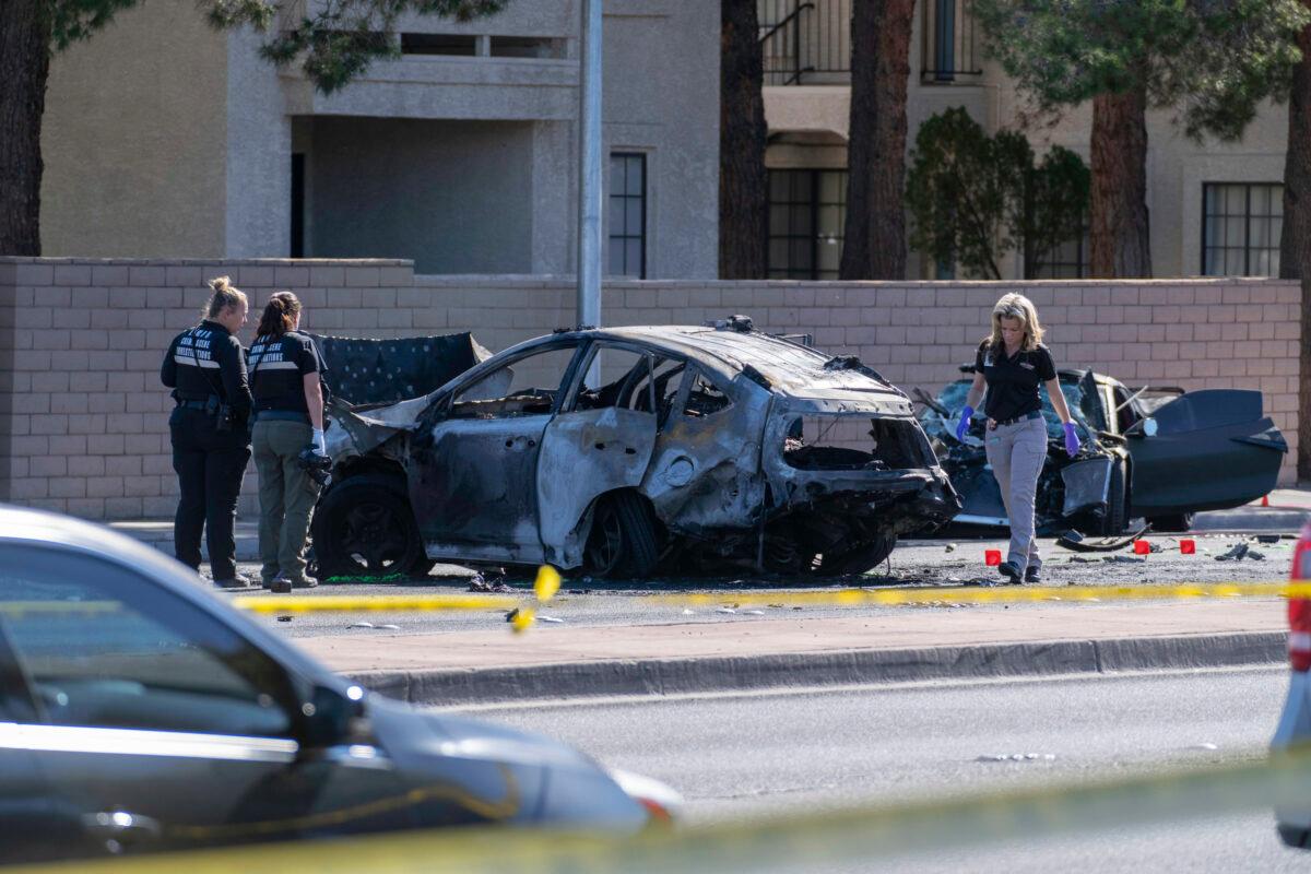 Las Vegas Metro Police investigators work at the scene of a fatal crash in Las Vegas on Nov. 2, 2021. (Eric Jamison/AP Photo)