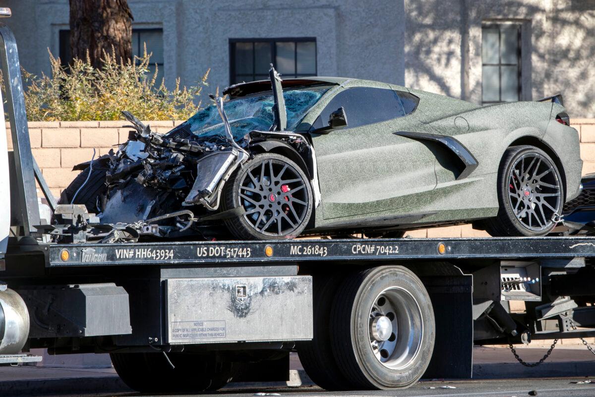 A Chevrolet Corvette owned by Las Vegas Raiders wide receiver Henry Ruggs III is shown on a flatbed truck after a fatal crash on South Rainbow Boulevard between Tropicana Avenue and Flamingo Road in Las Vegas on Nov. 2, 2021. (Steve Marcus/Las Vegas Sun via AP)