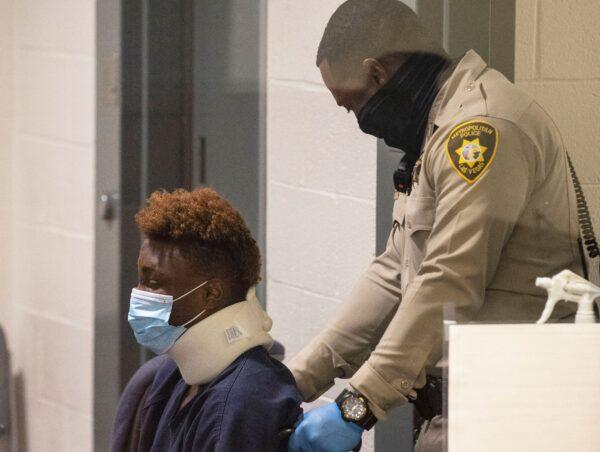 Former Raiders wide receiver Henry Ruggs, accused of DUI resulting in death, is brought into the courtroom during his initial arraignment at the Regional Justice Center in Las Vegas, Nev., on Nov. 3, 2021. (Bizuayehu Tesfaye/Las Vegas Review-Journal via AP)
