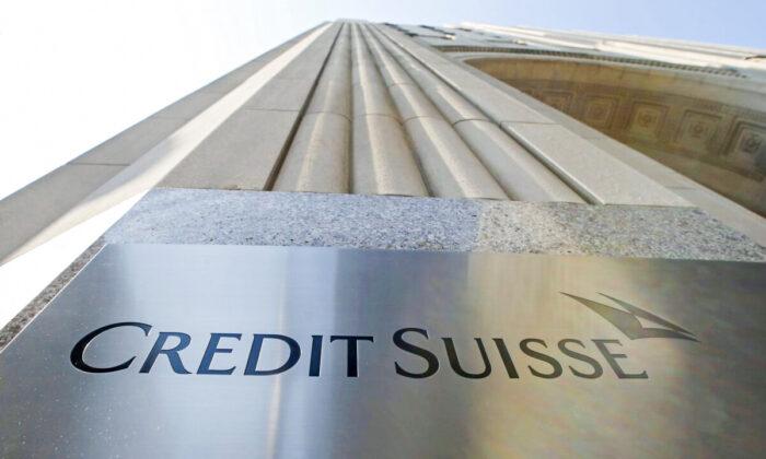 Credit Suisse Third Quarter Net Profit Falls 21 Percent, Sees Fourth Quarter Loss