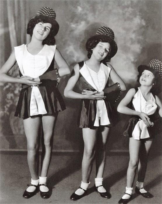 Singer Judy Garland (R), began her career as Frances Gumm in vaudeville as part "The Gumm Sisters." In this circa 1930 promotional photo, she appears with her sisters. (Courtesy of Elizabeth/ClassicActresses)