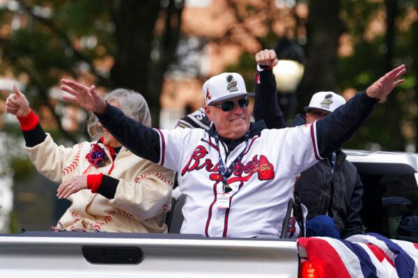 Atlanta Braves manager Brian Snitker celebrates the team's victory during a victory parade, in Atlanta, on Nov. 5, 2021. (Brynn Anderson/AP Photo)