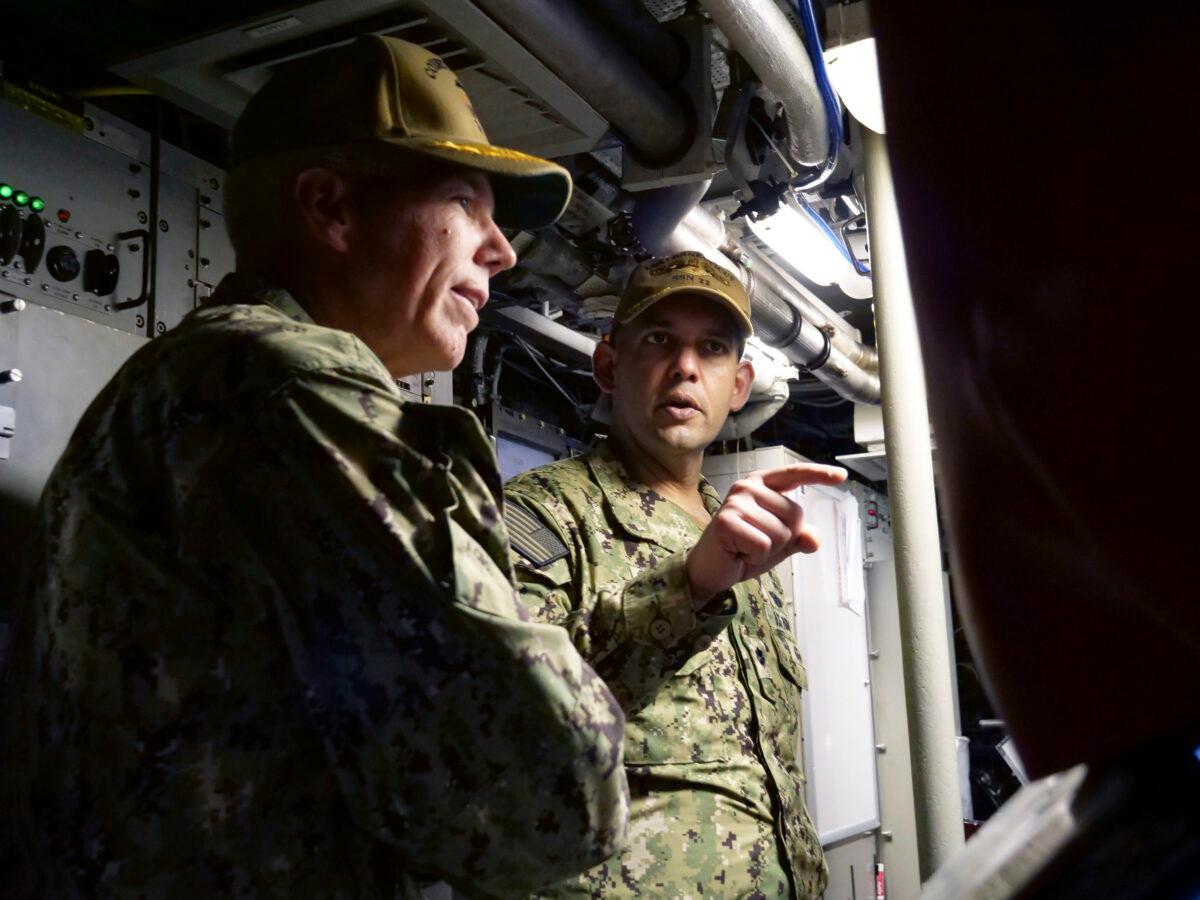 Cmdr. Cameron Aljilani, commanding officer of the Seawolf-class fast-attack submarine USS Connecticut (SSN 22), right, speaks with Commander, U.S. 7th Fleet, Vice Adm. Karl Thomas, during a tour of the submarine at Fleet Activities Yokosuka, Aug. 2. Connecticut is conducting maritime operations in the U.S. 7th Fleet to maintain a safe and open Indo-Pacific. (U.S. Navy photo by Mass Communication Specialist 1st Class Amanda S. Kitchner)