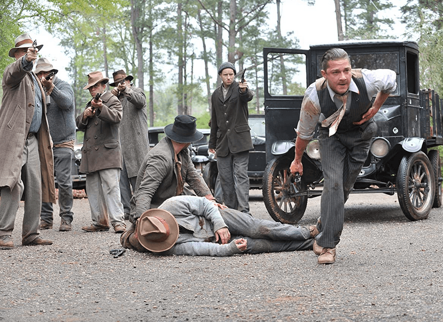 A gun-toting showdown between government agents and illegal bootleggers, with Shia LaBeouf, far right, in "Lawless." (Richard Foreman/The Weinstein Company)