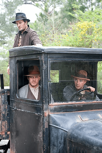 (L–R) Howard (Jason Clarke), Forrest (Tom Hardy), and Jack (Shia LaBeouf) play the true-life outlaw Bondurant brothers, in the bootlegging drama “Lawless.” (Richard Foreman/The Weinstein Company)