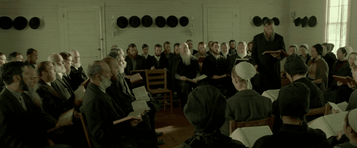 The Amish-like, Christian Dunkard sect sing in church, in "Lawless." (Richard Foreman/The Weinstein Company)