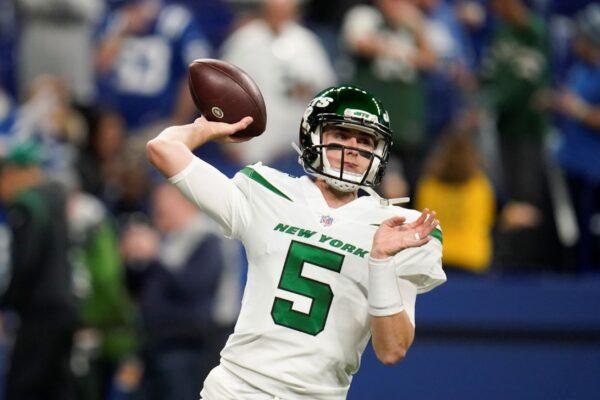 New York Jets quarterback Mike White (5) throws before an NFL football game between the New York Jets and Indianapolis Colts, in Indianapolis on Nov. 4, 2021. (Michael Conroy/AP Photo)
