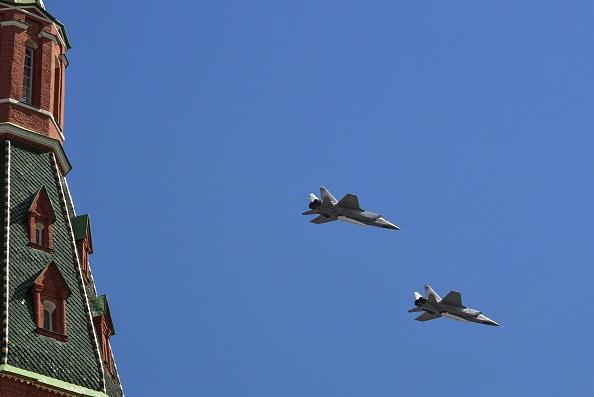 Russia's MiG-31 supersonic interceptor jets carrying hypersonic Kinzhal (Dagger) missiles fly over Red Square during the Victory Day military parade in Moscow on May 9, 2018. (Yuri Kadobnov/AFP via Getty Images)