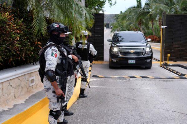 Government forces guard the entrance of hotel after an armed confrontation near Puerto Morelos, Mexico, on Nov. 4, 2021. (Karim Torres/AP Photo)