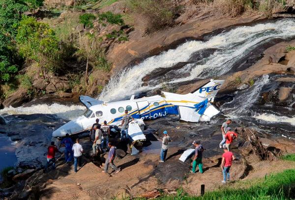 This handout photo shows the airplane that crashed that was transporting Brazilian singer Marilia Mendonca, in the southeastern Brazilian of state Minas Gerais on Nov. 5, 2021. (Minas Gerais Military Firefighters Corps via AP)
