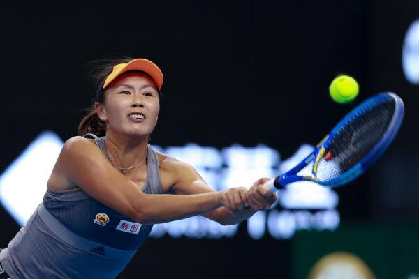 Peng Shuai returns a shot during the women's singles first round match of 2019 China Open at the China National Tennis Center in Beijing, China on Sept. 28, 2019. (Lintao Zhang/Getty Images)