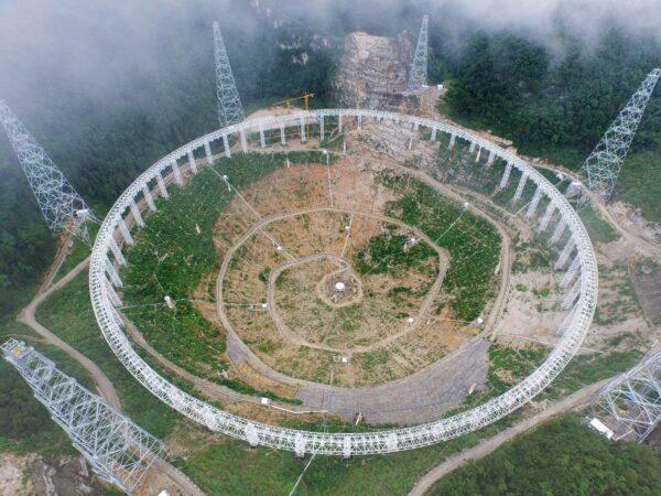 A five-hundred-meter Aperture Spherical Radio Telescope (FAST) under construction in Pingtang, southwest China's Guizhou province on July 29, 2015. (STR/AFP via Getty Images)