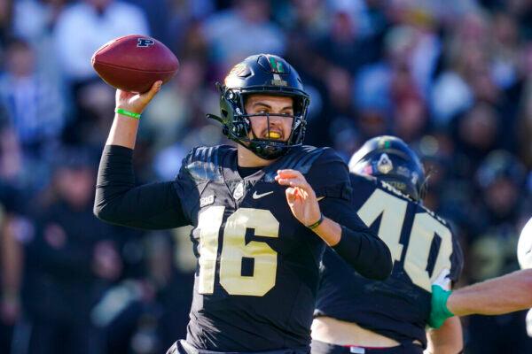 Purdue quarterback Aidan O'Connell (16) throws against Michigan State during the first half of an NCAA college football game in West Lafayette, Ind., on Nov. 6, 2021. (Michael Conroy/AP Photo)
