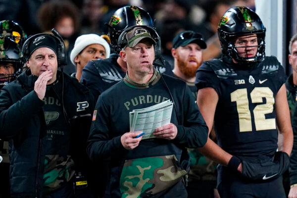 Purdue head coach Jeff Brohm (C) watches from the sideline during the second half of an NCAA college football game against Michigan State in West Lafayette, Ind., on Nov. 6, 2021 (Michael Conroy/AP Photo)