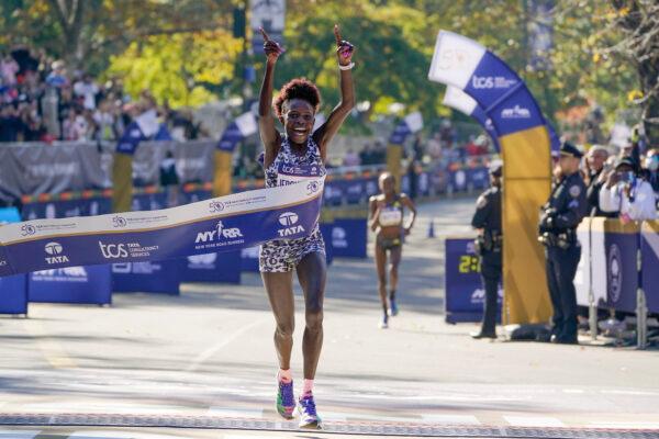 Peres Jepchirchir of Kenya crosses the finish line first in the women's division of the New York City Marathon in New York on Nov. 7, 2021. (Seth Wenig/AP Photo)