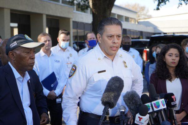Chief of the Houston Fire Department Sam Peña (C), flanked by Houston Mayor Sylvester Turner (L) and Harris County Judge Lina Hidalgo (R), speaks at a press conference outside of the Wyndham Houston Hotel near NRG Park in Houston,, on Nov. 6, 2021. (François Picard/AFP via Getty Images)