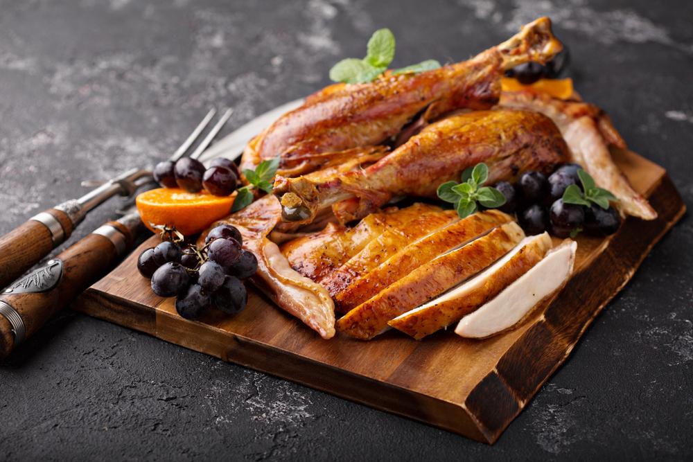Let the turkey rest before carving into juicy, flavorful pieces for your feast. (Elena Veselova/Shutterstock)