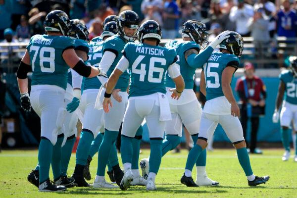 Jacksonville Jaguars place kicker Matthew Wright (15) walks off the field with teammates after kicking a field goal against the Buffalo Bills during the first half of an NFL football game in Jacksonville, Fla., on Nov. 7, 2021. (Phelan M. Ebenhack/AP Photo)