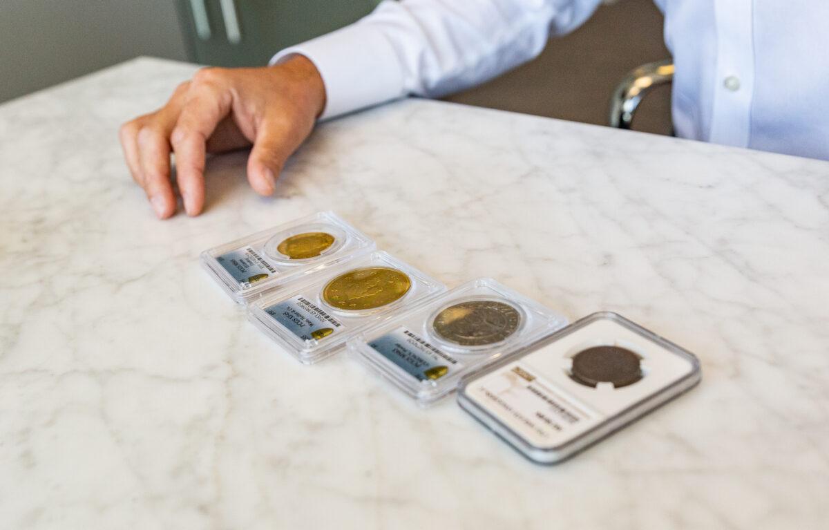 Michael Contursi shows extremely valuable coins at the Rare Coin Wholesalers offices in Irvine, Calif., on Oct. 19, 2021. (John Fredricks/The Epoch Times)