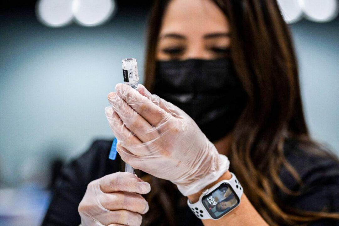 Growing Number of Businesses Mandating COVID-19 Booster Shots