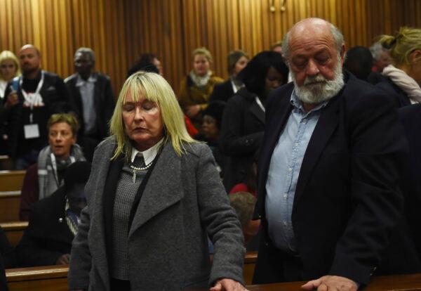 The parents of the late Reeve Steenkamp, June (L) and Barry Steenkamp (R) leave the High Court in Pretoria, South Africa, on July 6, 2016. (Masi Losi/Pool Photo via AP)