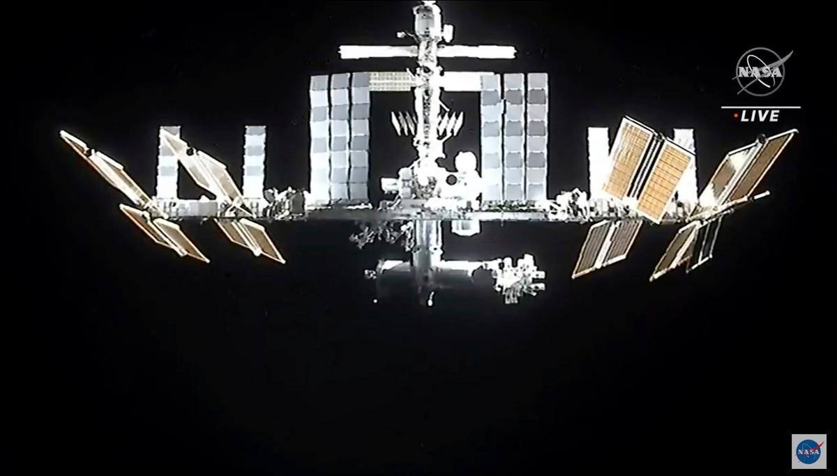 In this image from video provided by NASA, astronauts in the SpaceX Dragon capsule undock from the International Space Station on Nov. 8, 2021. (NASA via AP)