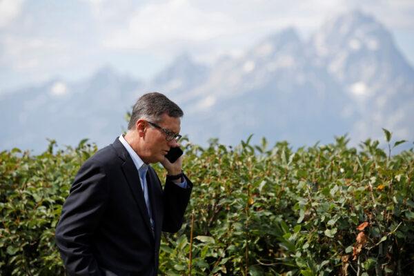Federal Reserve Vice Chair Richard Clarida talks on the phone during the three-day "Challenges for Monetary Policy" conference in Jackson Hole, Wyoming, U.S. on Aug. 23, 2019. (Jonathan Crosby/Reuters)