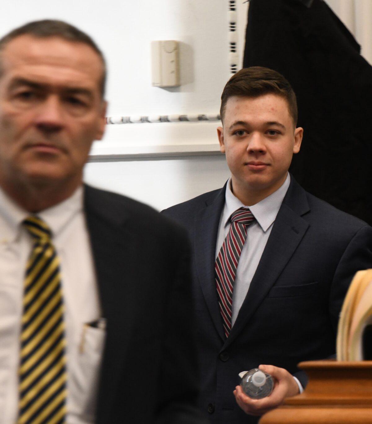 Kyle Rittenhouse and lead defense attorney Mark Richards arrive for his trial at the Kenosha County Courthouse in Kenosha, Wis., on Nov. 8, 2021. (Mark Hertzberg/Pool/Getty Images)