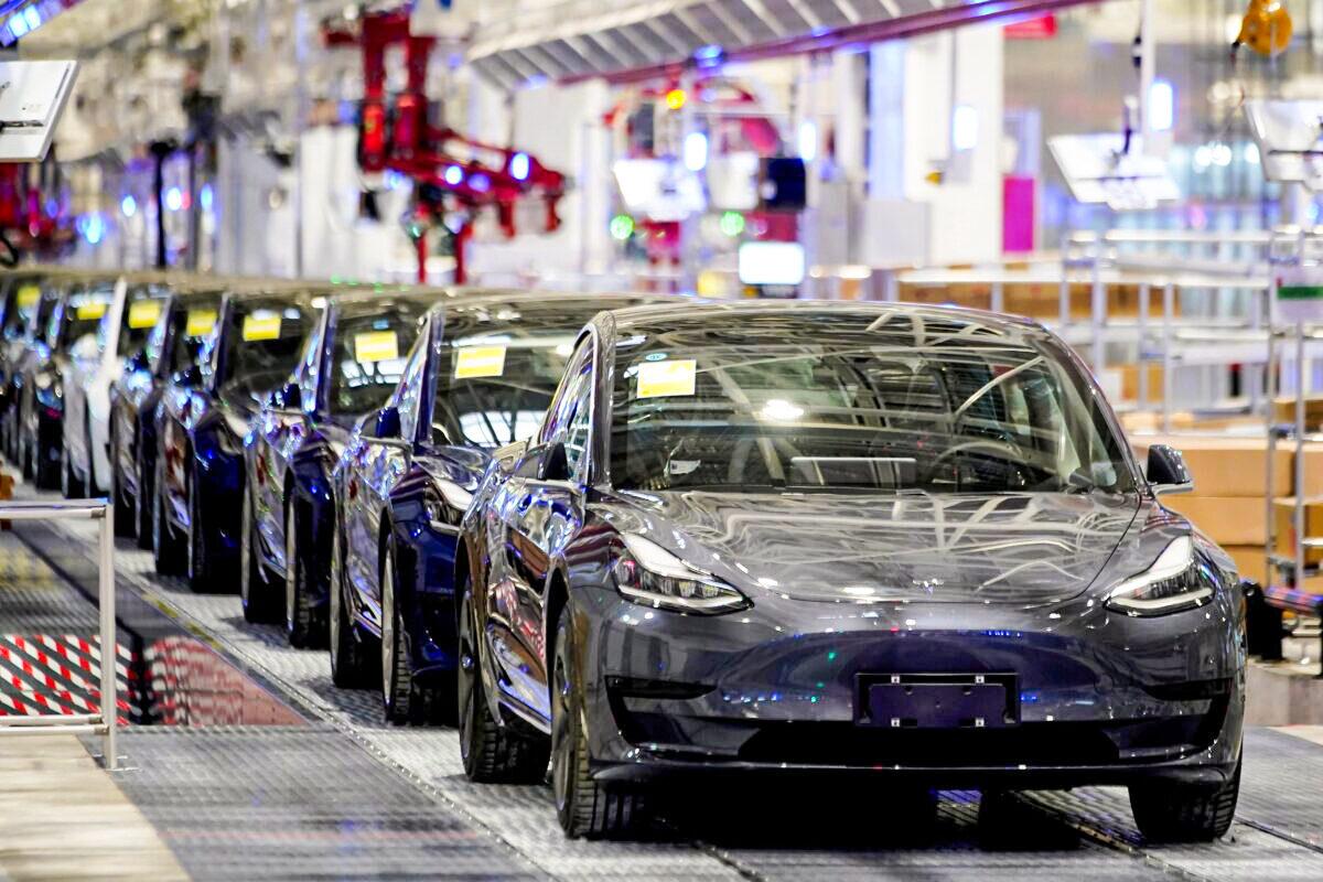Tesla China-made Model 3 vehicles are seen during a delivery event at its factory in Shanghai, China on Jan. 7, 2020. (Aly Song/Reuters)