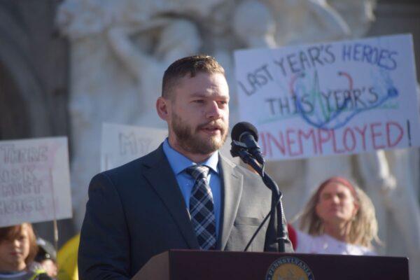 Brandon Adkins, a Wellspan Health emergency department technician at Chambersburg Hospital, speaks about medical freedom during a rally in Harrisburg, Pa., on Nov. 9, 2021. (Beth Brelje/The Epoch Times)