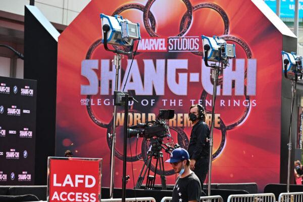 A cameraman awaits the start of the red carpet for the world premiere of Marvel's "Shang-Chi and the Legend of the Ten Rings" in Hollywood, Calif., Aug. 16, 2021. (Robyn Beck/AFP via Getty Images)