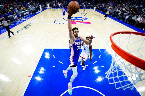 Philadelphia 76ers' Furkan Korkmaz goes up for a dunk during the first half of an NBA basketball game against the New York Knicks in Philadelphia, on Nov. 8, 2021. (Matt Slocum/AP Photo)