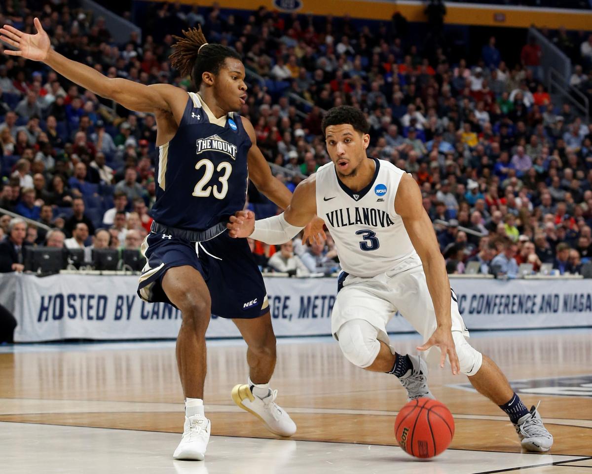 Villanova Wildcats guard Josh Hart (3) drives against Mount St. Mary's Mountaineers guard Greg Alexander (23) in the first half during the first round of the NCAA Tournament at KeyBank Center in Buffalo, NY., on March 16, 2017. (Timothy T. Ludwig-USA TODAY Sports via Reuters)