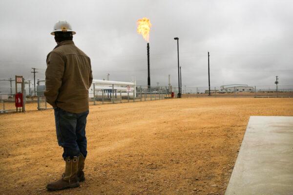 Flared natural gas is burned off at Apache Corp. operations at the Deadwood natural gas plant in the Permian Basin, Garden City, Texas on Feb. 5, 2015. (Spencer Platt/Getty Images)