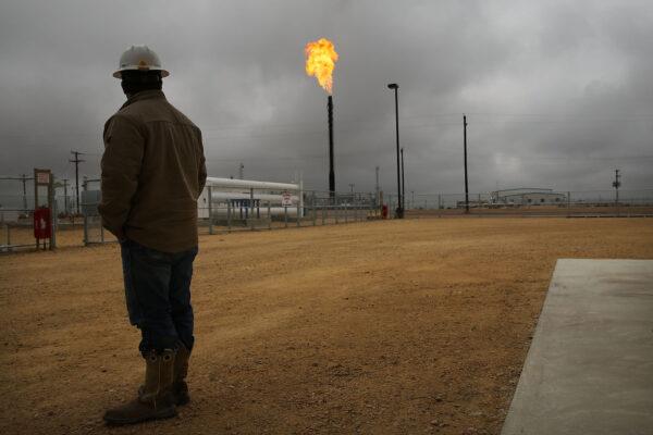 Flared natural gas is burned off at Apache Corporation's operations at the Deadwood natural gas plant in the Permian Basin, Garden City, Texas on Feb. 5, 2015. (Spencer Platt/Getty Images)