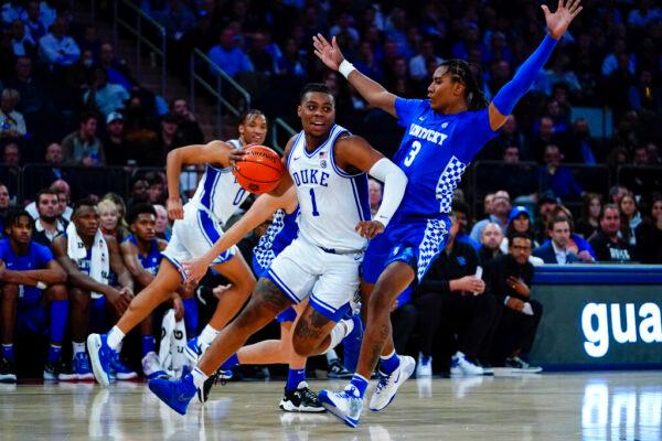 Duke's Trevor Keels (1) drives past Kentucky's TyTy Washington (3) during the first half of an NCAA college basketball game in New York, on Nov. 9, 2021. (Frank Franklin II/AP Photo)